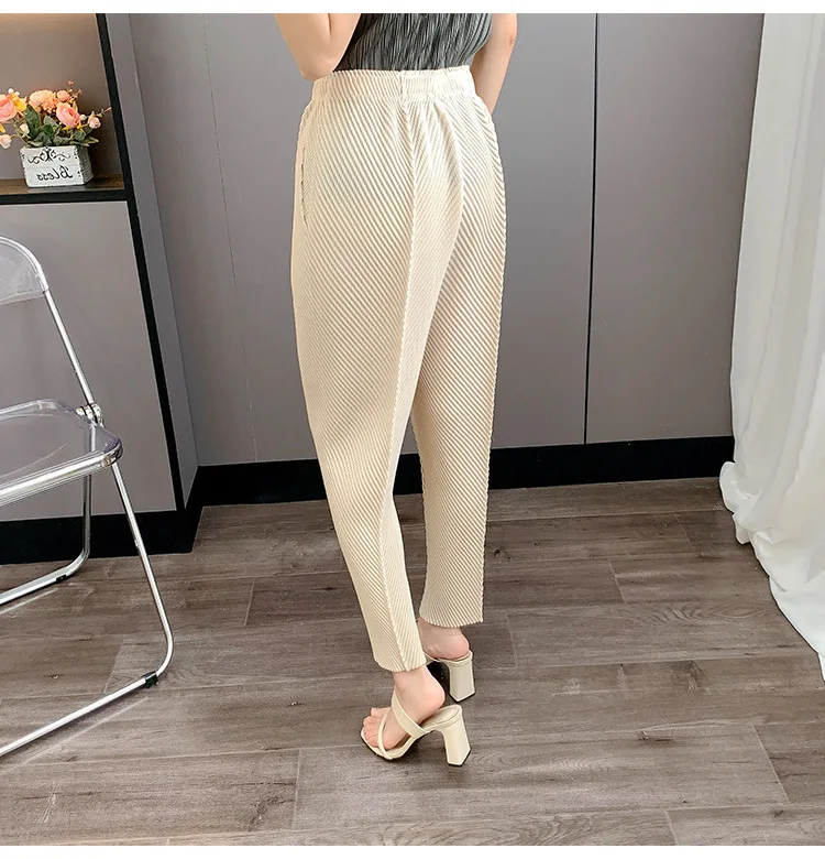 Miyake Pleated 2025 New Summer Casual Harem Pants Versatile Loose Big Yards Radish Pants Large Elastic Women's Commuter Office Miyake Pleated 2025 New Summer Casual Harem Pants Versatile Loose Big Yards Radish Pants Large Elastic Women's Commuter Office
